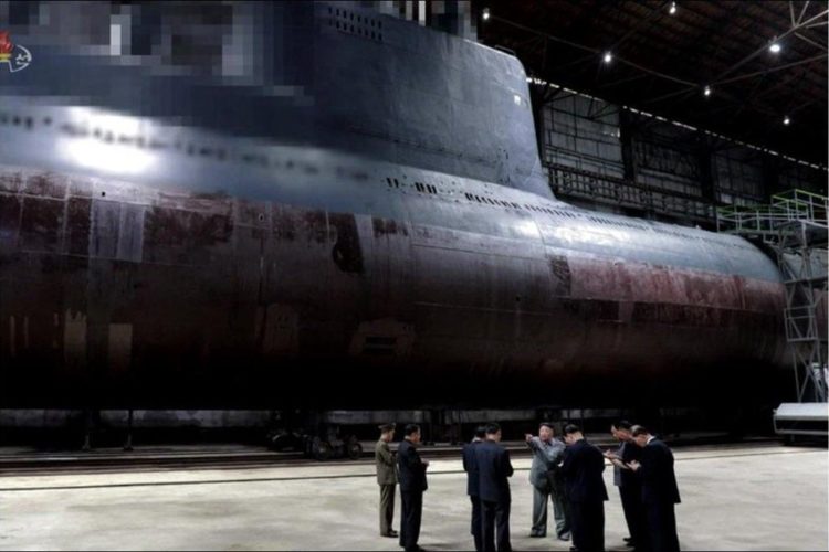 Kim Jong-un during his July 2019 inspection of the “newly built submarine” at what is believed to be the Sinpo South Shipyard (Rodong Sinmun)